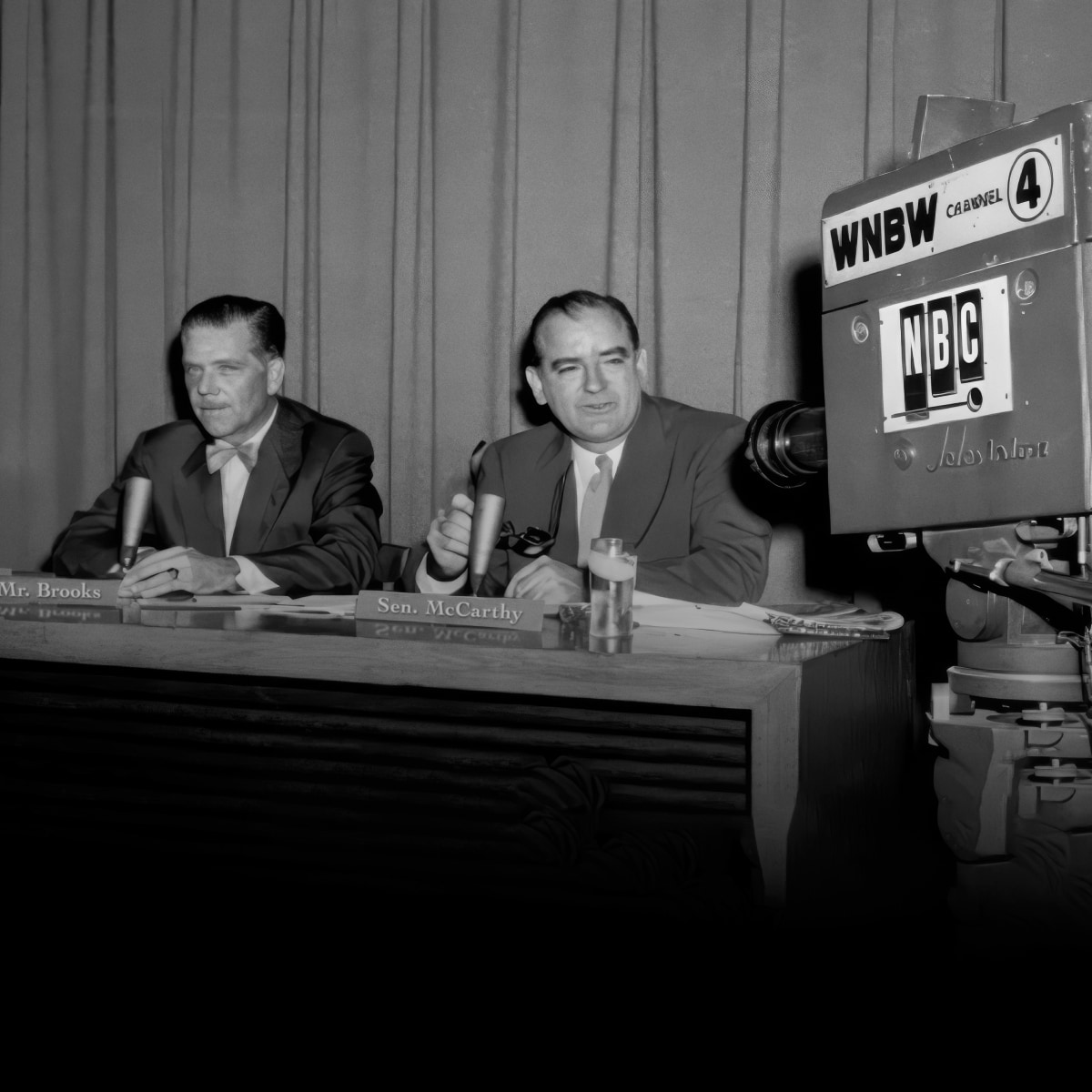 Senator McCarthy and Mr. Brooks giving a televised speech
